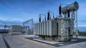 Modern electrical substation with a large oil-immersed transformer and switchgear