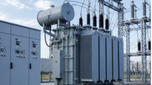 Three-phase step-up transformer connecting low-voltage switchgear to higher-voltage substation equipment