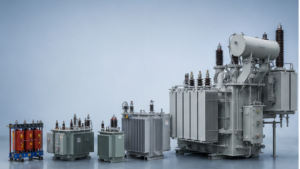 Lineup of transformers increasing from compact distribution units to a large power transformer