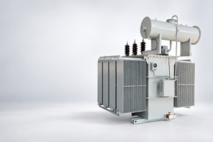 Illustration of an oil-immersed power transformer for an amps-to-kVA calculation guide